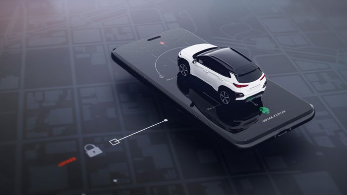 Modellauto steht auf einem Smartphone