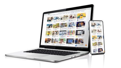 Ein Laptop und ein Handy mit der ARCD-Vorteilswelt.