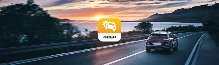 Auto fährt in den Sonnenuntergang, Logo Pannenhilfe-App.